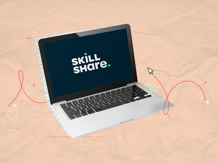 Laptop with a Skillshare logo on the screen.