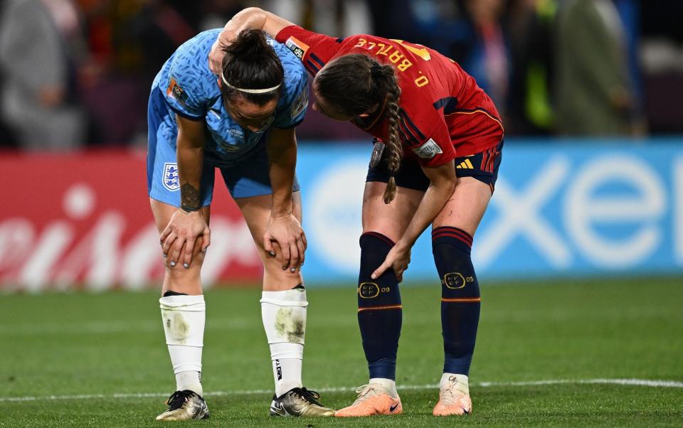 Lucy Bronze is consoled by her new Barcelona team-mate Ona Batlle