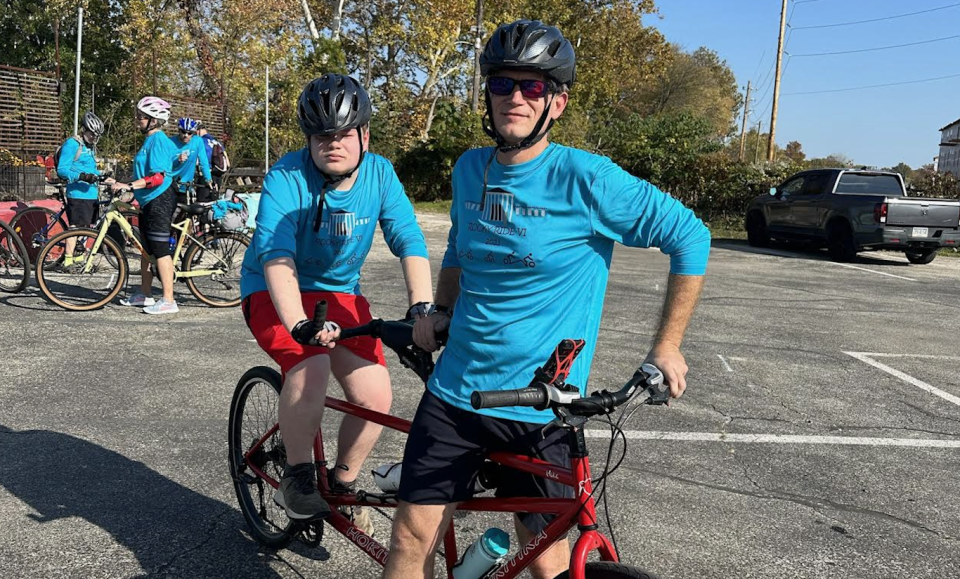 Nathanael and Tim on their tandem bike. (Tim Ogden)