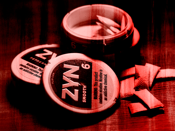 ZYN nicotine cases and pouches are seen on a table