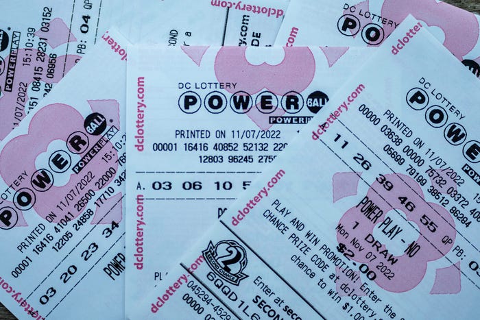 In this photo illustration, tickets for the upcoming Powerball lottery are seen on November 07, 2022 in Washington, DC