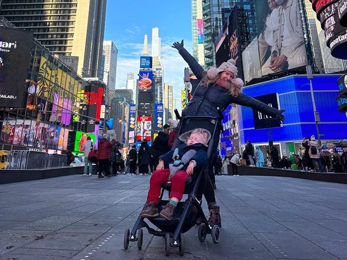 Mother with a stroller in Times Square New York City