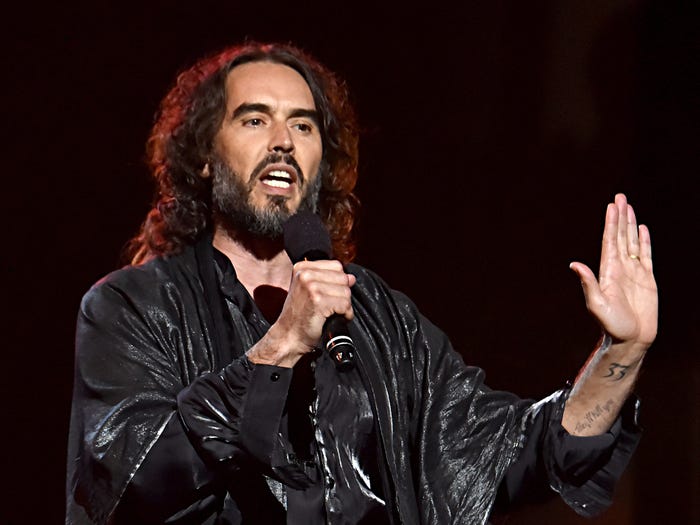 Russell Brand speaks onstage during MusiCares Person of the Year honoring Aerosmith at West Hall at Los Angeles Convention Center on January 24, 2020 in Los Angeles, California