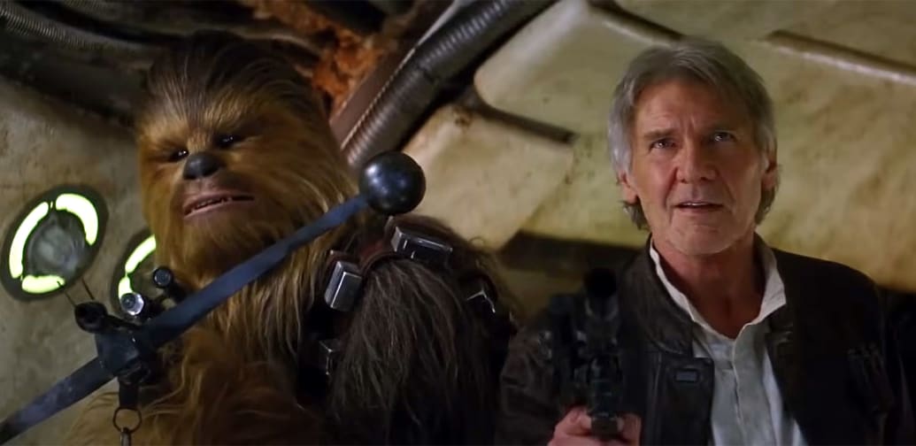 Photo still of Han and Chewbacca; “Chewie, we’re home” in The Force Awakens