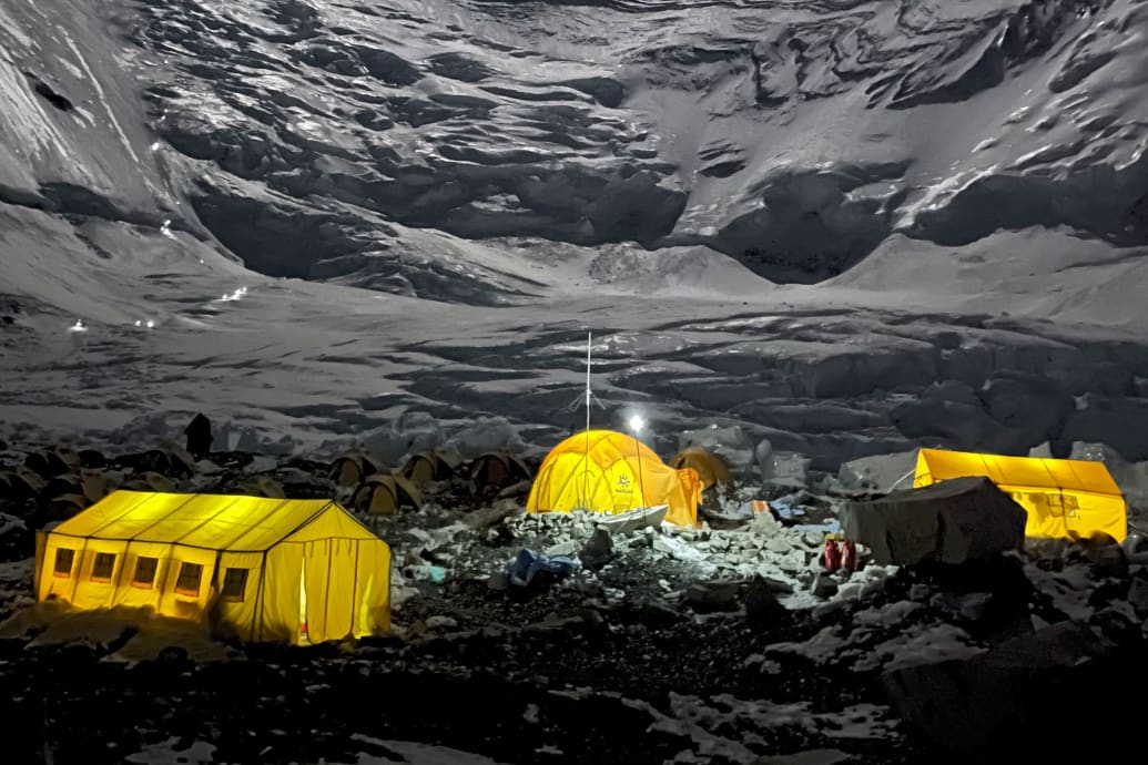 Mountaineer's tents lit up at night at Camp 2 of Mount Everest, in Nepal.
