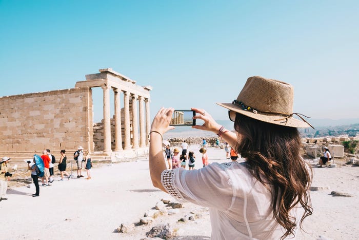 Tourist taking photo in Athens