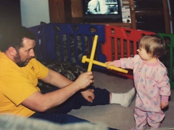 Dad and daughter playing