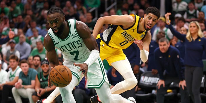 Jaylen Brown #7 of the Boston Celtics drives passed Tyrese Haliburton #0 of the Indiana Pacers during Game 1 of the Eastern Conference Finals.