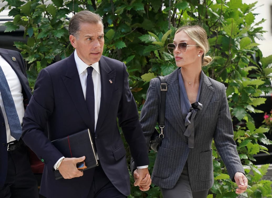 Hunter Biden, son of U.S. President Joe Biden, arrives at the federal court with his wife Melissa Cohen Biden, on the opening day of his trial on criminal gun charges in Wilmington, Delaware, U.S., June 3, 2024.