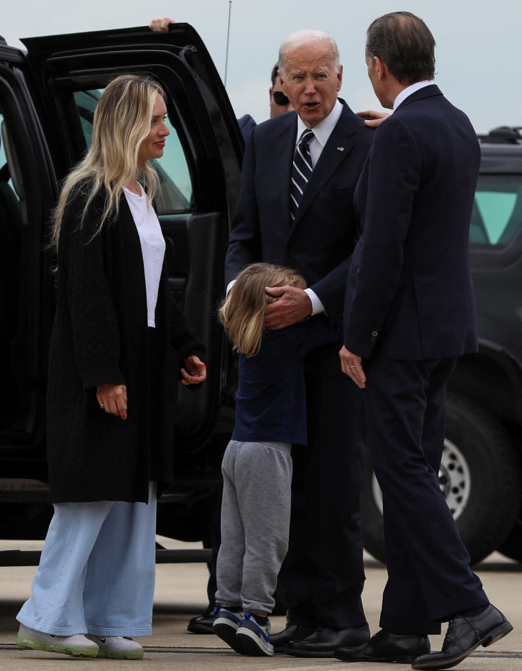 U.S. President Joe Biden embraces his grandson, Beau Biden, as his daughter-in-law, Melissa Cohen Biden, and his son, Hunter Biden, who earlier in the day was found guilty on all three counts in his criminal gun charges trial. June 11, 2024.