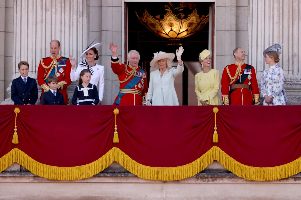 King Charles, Queen Camilla, William, Prince of Wales, Catherine, Princess of Wales, Prince George, Princess Charlotte, Prince Louis, Sophie, Duchess of Edinburgh, Prince Edward, Duke of Edinburgh, Lady Louise Windsor, appear at Buckingham Palace.