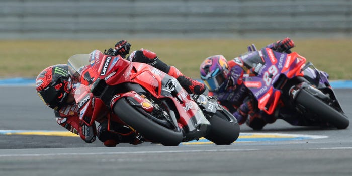 Francesco Bagnaia of Italy #1 and Ducati Lenovo Team, Jorge Martin of Spain #89 and Prima Pramac Racing (Ducati) in action during the 2024 MotoGP of France race.