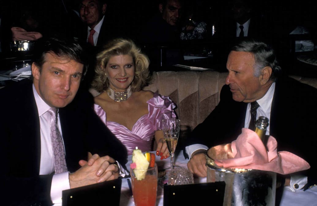 Donald Trump, Ivana Trump, and Preston Robert Tisch kick it at Trump’s 42nd birthday in 1988 in Atlantic City, New Jersey.