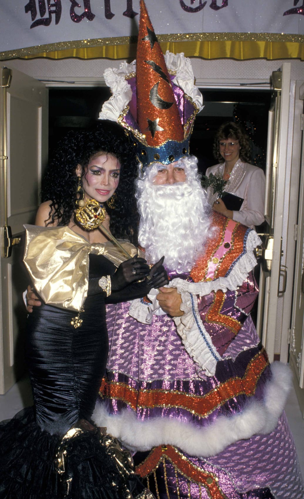 LaToya Jackson and some kind of mutant Santa Claus turn up at Trump’s 42nd birthday celebration in Atlantic City.