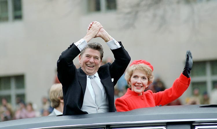 Ronald and Nancy Reagan wave from the limousine during their inaugural parade in Washington, D.C., U.S. in January 1981.