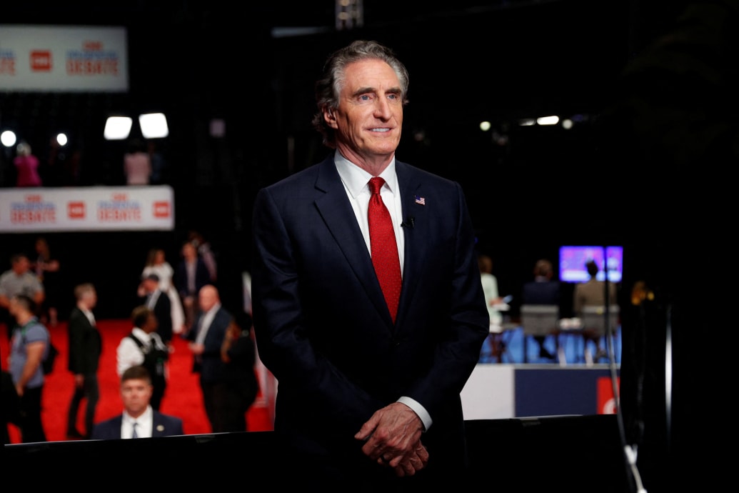 North Dakota Governor Doug Burgum (R) speaks to members of the press on the day of the first presidential debate hosted by CNN in Atlanta, Georgia, U.S., June 27, 2024.